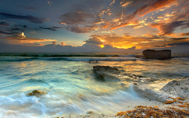 Sunset ocean rocky shore rock free wallpaper for desktop - medium preview image