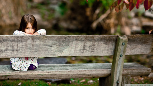 Little girl bench looking camera free wallpaper for desktop - medium preview image