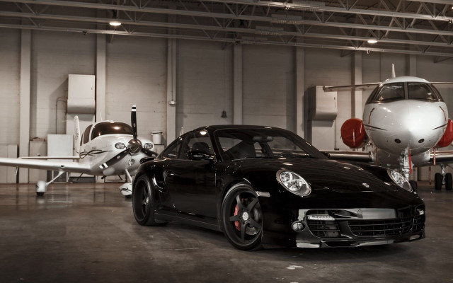 Black sports car garage small free wallpaper for desktop - medium preview image