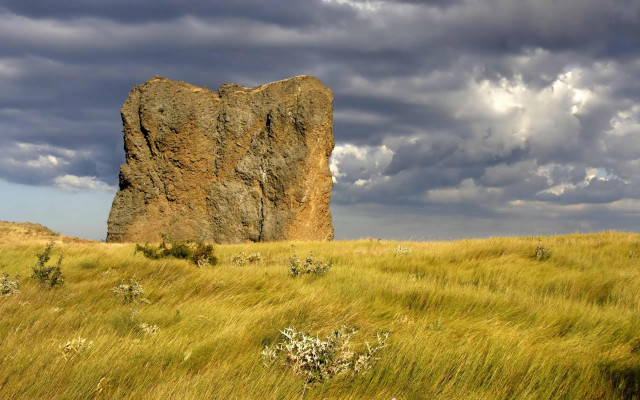 Large rock grassy field cloudy free wallpaper for desktop - medium preview image