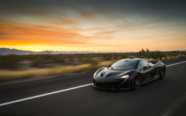 Black sports car sunset mountain free wallpaper for desktop - medium preview image
