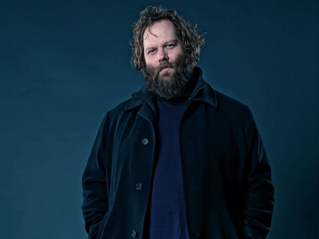 Man beard coat posing picture free wallpaper for desktop - medium preview image