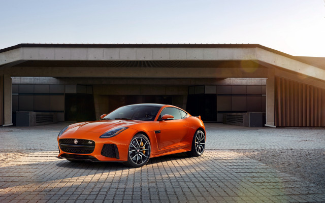 Orange sports car garage door free wallpaper for desktop - medium preview image