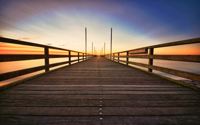 Wooden pier sunset poles mountains free wallpaper for desktop - medium preview image