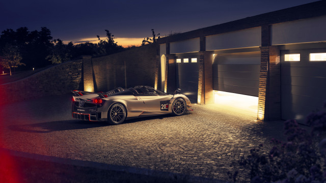 Sports car garage night city free wallpaper for desktop - medium preview image