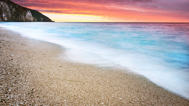 Beach wave cliff pink sky free wallpaper for desktop - medium preview image