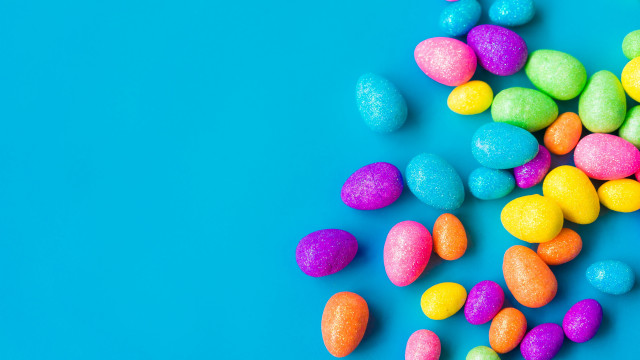 Candy egg pile blue background free wallpaper for desktop - medium preview image