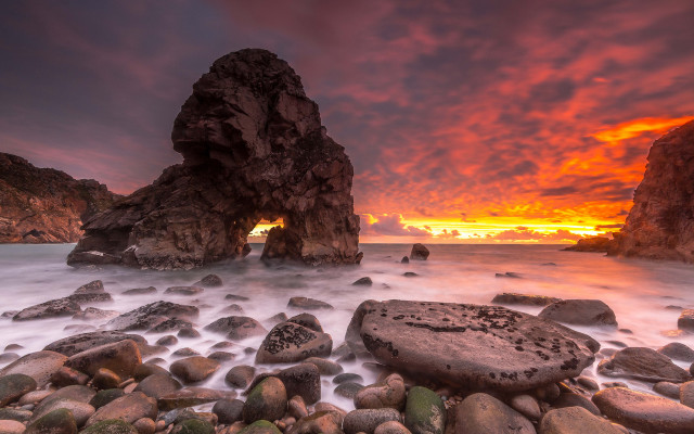 Rocky beach sunset formation campfire free wallpaper for desktop - medium preview image