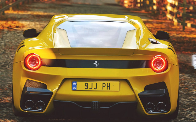 Yellow sports car forest leaves free wallpaper for desktop - medium preview image