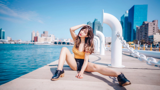 Woman dock waterfront cityscape fashion free wallpaper for desktop - medium preview image