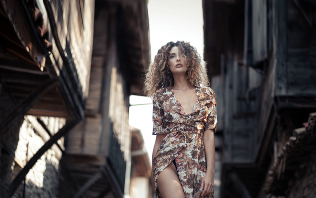 Woman floral dress street suitcase free wallpaper for desktop - medium preview image