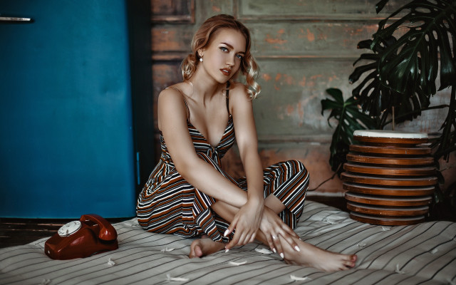 Woman sitting bed blue wall #2 free wallpaper for desktop - medium preview image