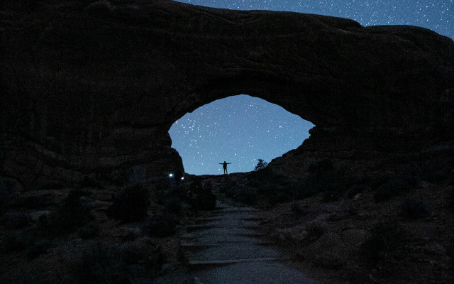 Cave star gazing astronaut night free wallpaper for desktop - medium preview image