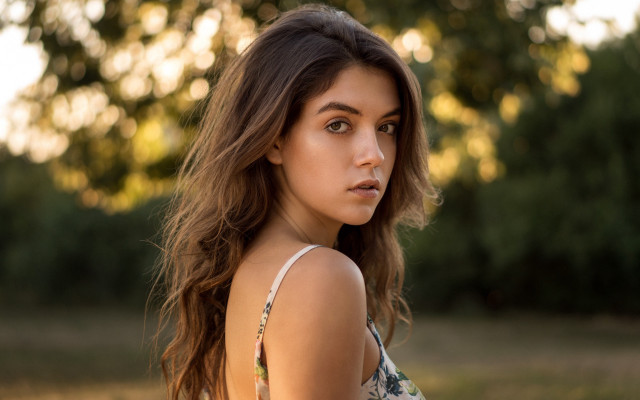 Woman long hair field bokeh free wallpaper for desktop - medium preview image