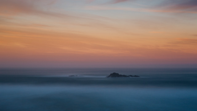 Beach rock sunset clouds impessionist free wallpaper for desktop - medium preview image