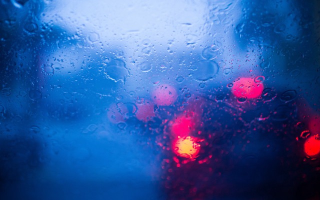 Blurry street light traffic rain free wallpaper for desktop - medium preview image