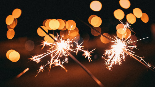 Sparklers table lights bokeh fireworks free wallpaper for desktop - medium preview image