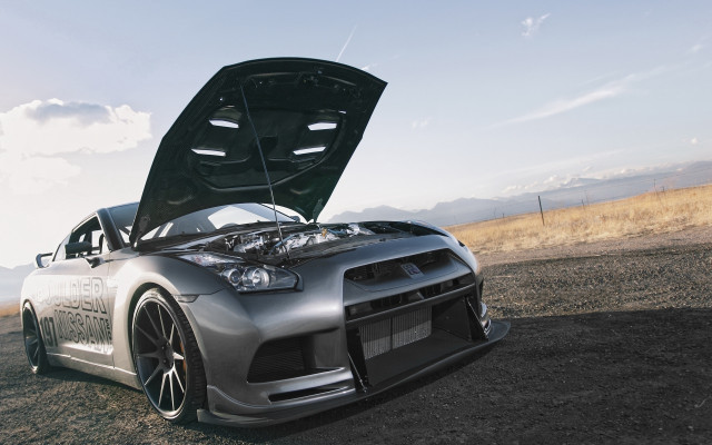 Car mountain dirt road clouds free wallpaper for desktop - medium preview image