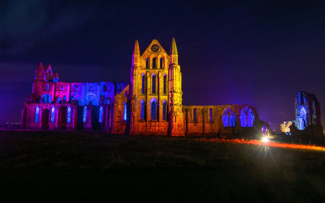 Cathedral lit cityscape night glowing free wallpaper for desktop - medium preview image