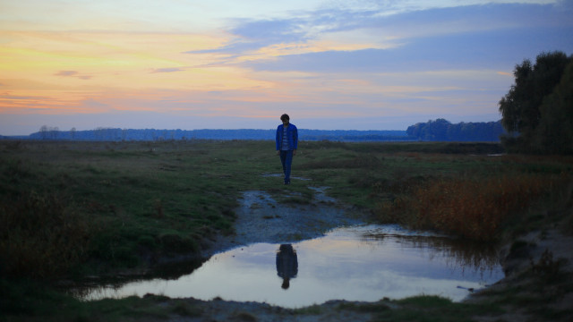 Man path puddle reflection sunset free wallpaper for desktop - medium preview image
