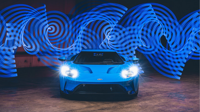 Blue sports car lighted wall free wallpaper for desktop - medium preview image