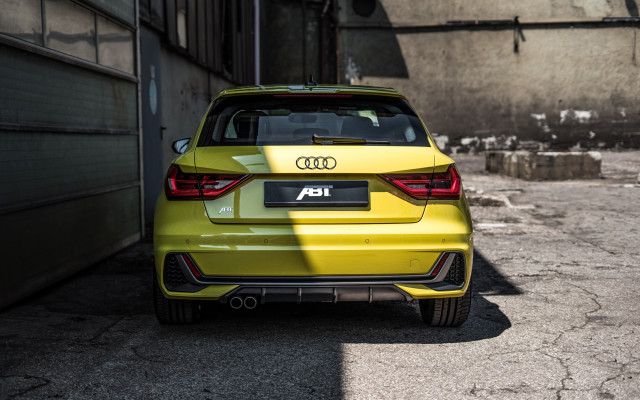 Yellow car garage building open free wallpaper for desktop - medium preview image