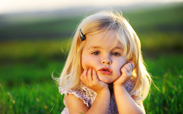 Little girl grass hands face #3 free wallpaper for desktop - medium preview image