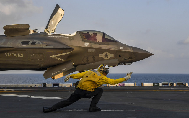 Fighter jet ship pilot yellow free wallpaper for desktop - medium preview image