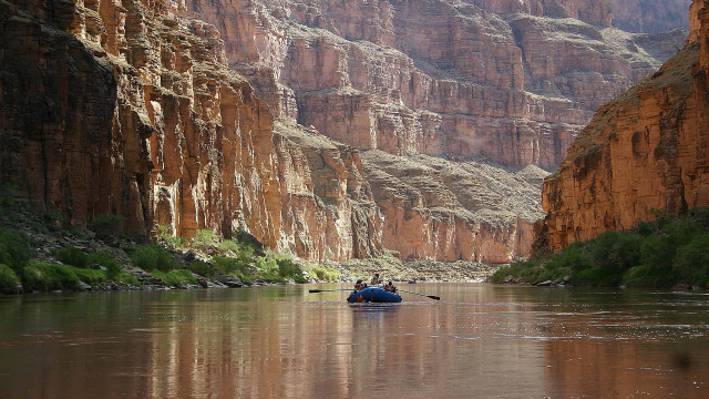 Man raft river canyon cliffs free wallpaper for desktop - medium preview image