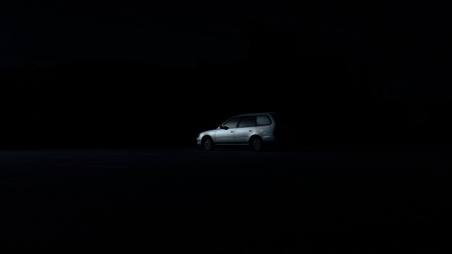 White car night parking headlights free wallpaper for desktop - medium preview image