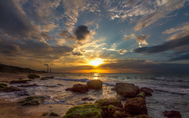 Sunset ocean rocks lighthouse cloudy free wallpaper for desktop - medium preview image