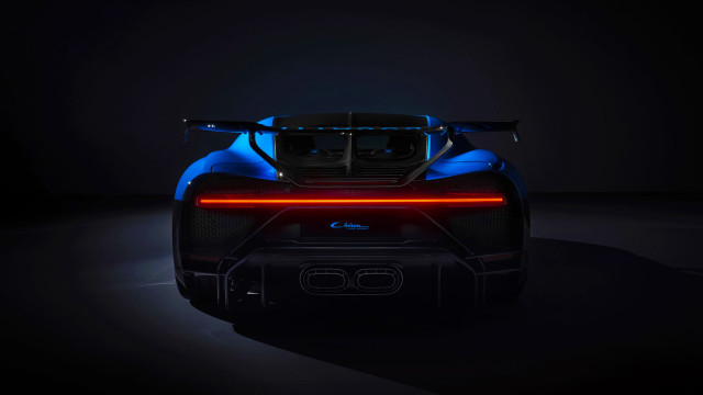 Blue sports car lights dark free wallpaper for desktop - medium preview image