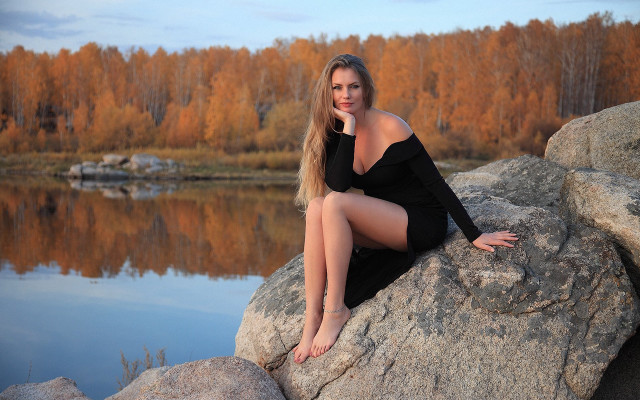 Woman lake rock trees clouds free wallpaper for desktop - medium preview image