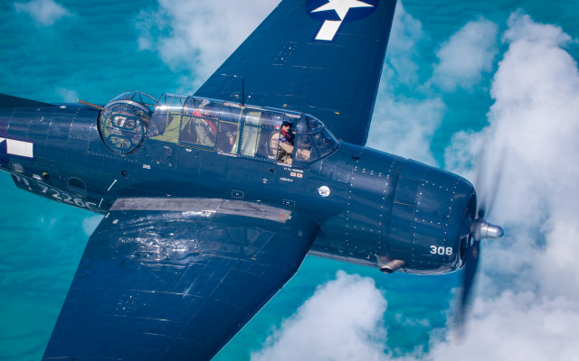 Blue airplane cockpit people sky free wallpaper for desktop - medium preview image