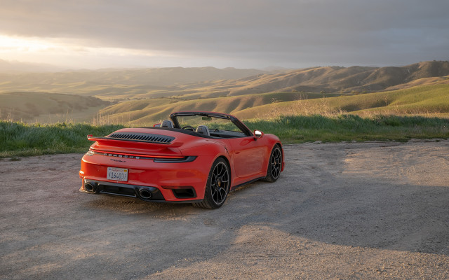 Red sports car mountains sunshine free wallpaper for desktop - medium preview image