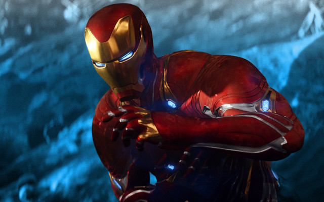 Man red suit golden object free wallpaper for desktop - medium preview image