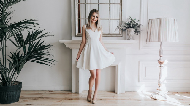 Woman white dress fireplace plant free wallpaper for desktop - medium preview image