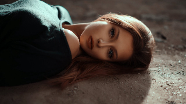 Woman laying on ground closed free wallpaper for desktop - medium preview image