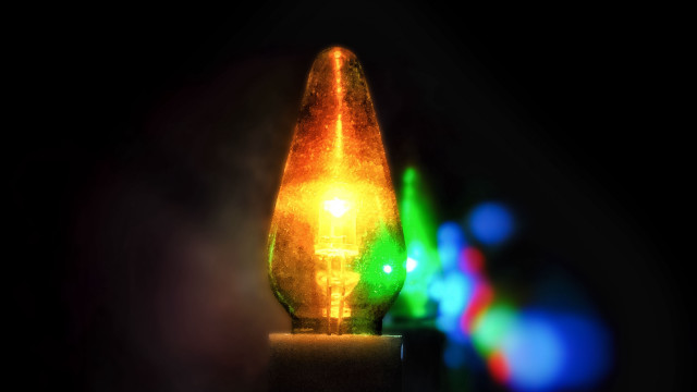 Light bulb closeup glowing bokeh free wallpaper for desktop - medium preview image