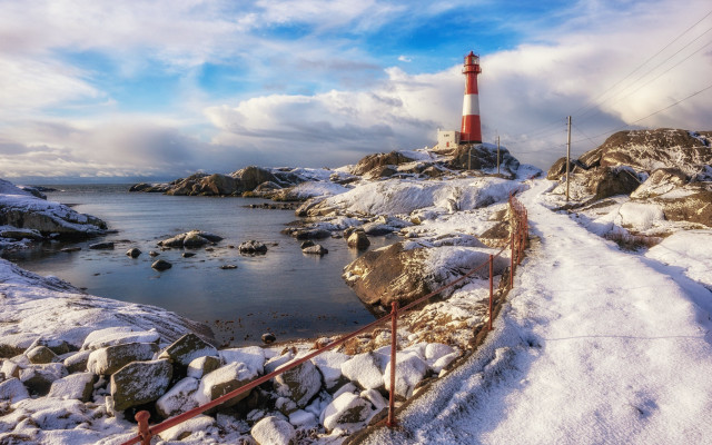 Lighthouse rocky shore snow fence free wallpaper for desktop - medium preview image