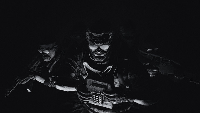 Man holding cellphone gun gloves free wallpaper for desktop - medium preview image