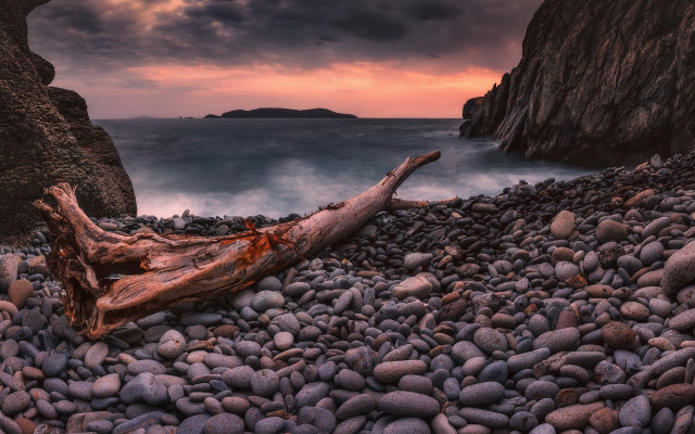 Rocky beach log ocean sunset free wallpaper for desktop - medium preview image