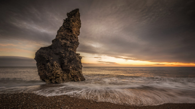 Rock sunset wave ocean beach free wallpaper for desktop - medium preview image