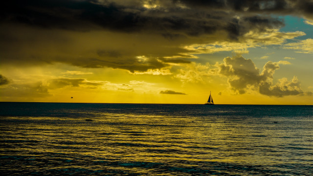 Sailboat ocean sunset cloudy sky #5 free wallpaper for desktop - medium preview image