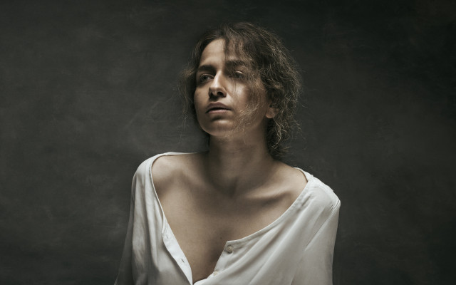 Woman white shirt blowing hair free wallpaper for desktop - medium preview image