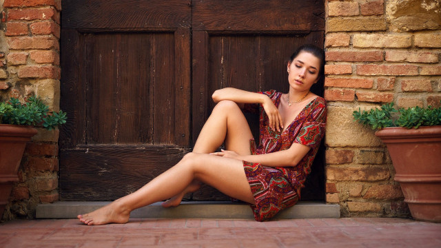 Woman sitting door olive skin free wallpaper for desktop - medium preview image