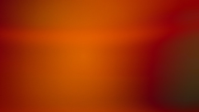 Blurry red orange background black free wallpaper for desktop - medium preview image