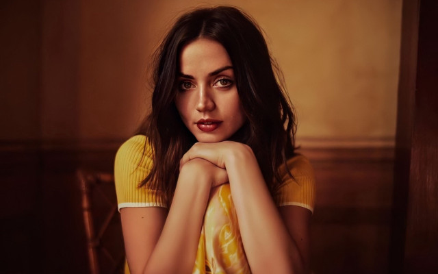 Woman sitting portrait freckles blackhair free wallpaper for desktop - medium preview image