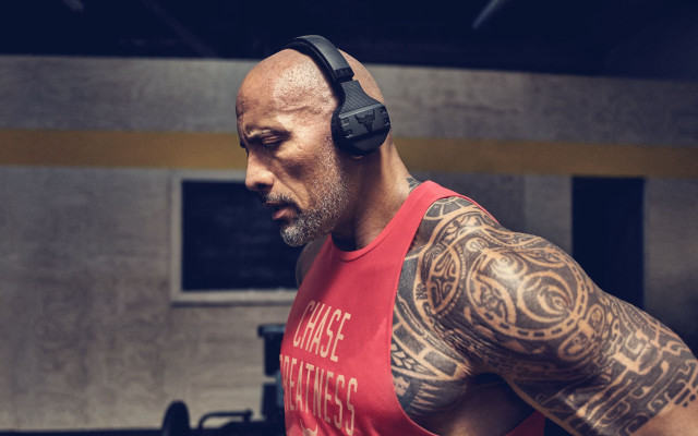 Man tattoo headphones focused cave free wallpaper for desktop - medium preview image
