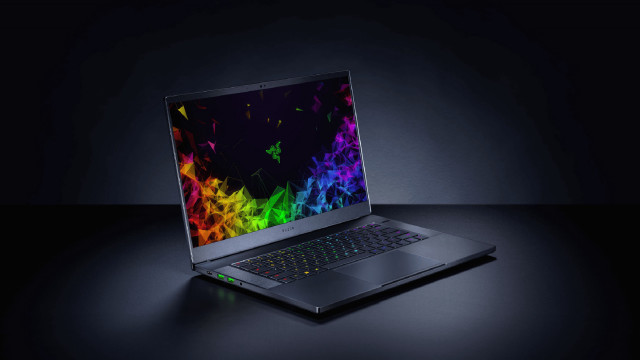Laptop colorful screen dark surface free wallpaper for desktop - medium preview image